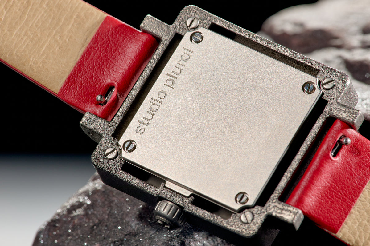 Close view of the watch’s sculpted titanium exterior.